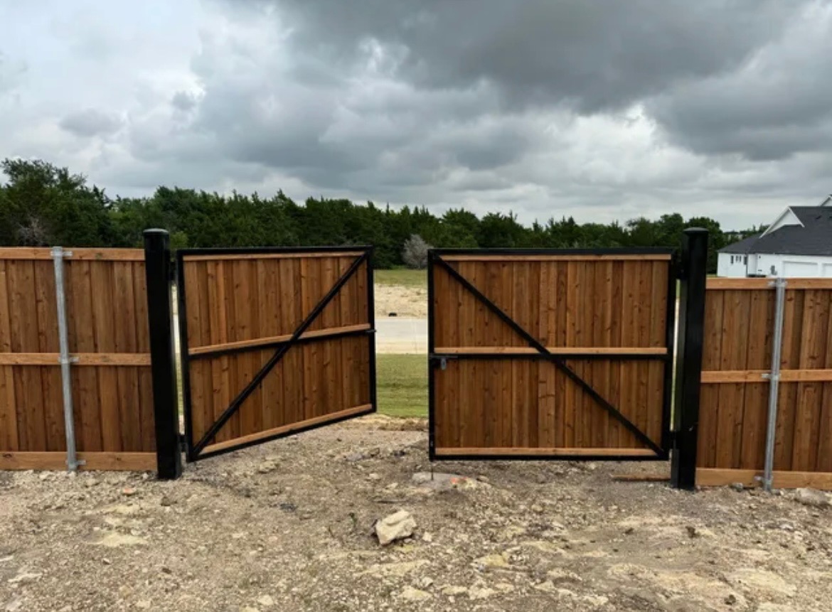 Cedar double swing gate with steel frame in Alvin TX