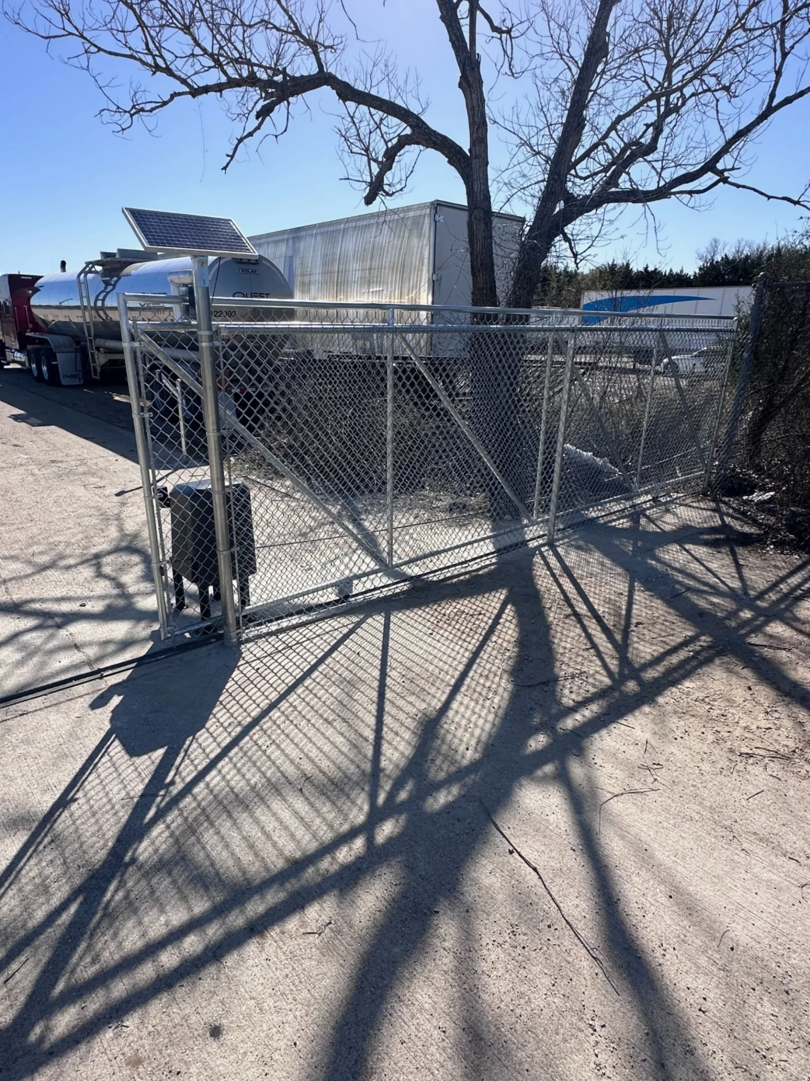 Commercial chain link sliding gate with solar operator in Pearland TX
